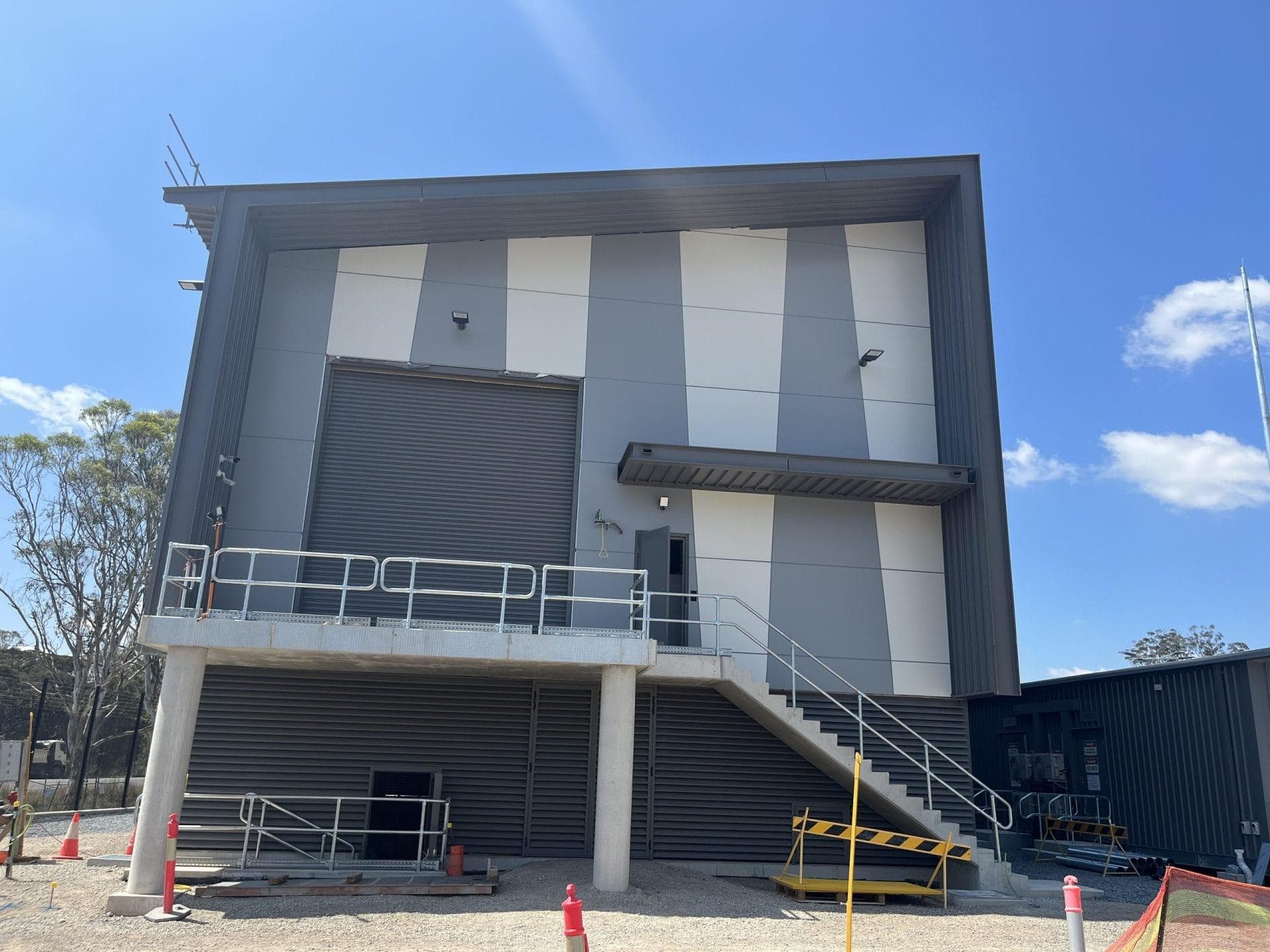 Elevated entry with stairs at Orchard Hills Substation featuring ALPOLIC™ NC aluminium façade