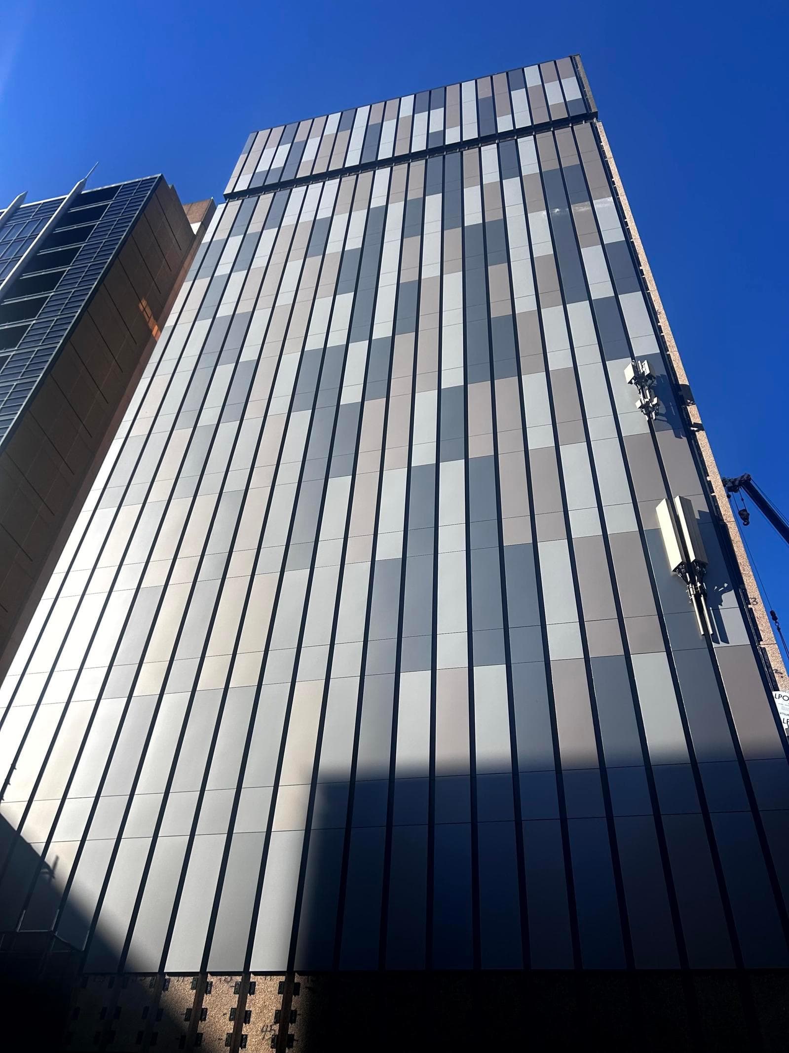 Upward view of Telstra Waymouth data exchange showcasing ALPOLIC™ NC/A1 reclad façade
