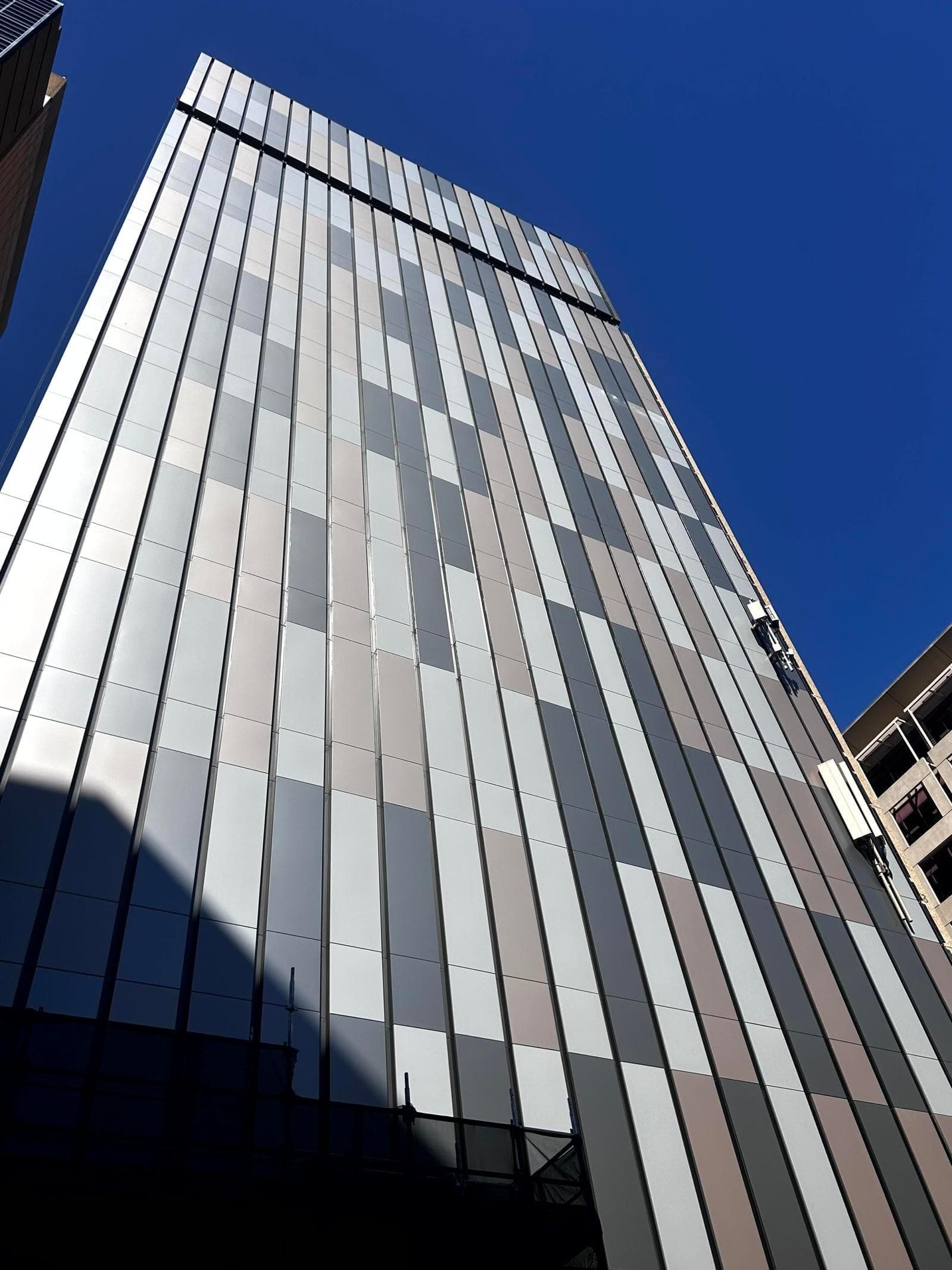 Telstra Waymouth data exchange façade featuring vertical ALPOLIC™ NC/A1 panels in metallic finishes